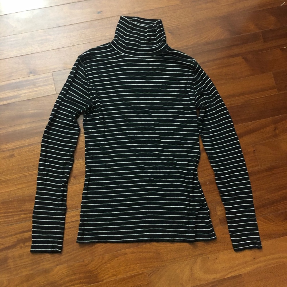 Black and white striped turtle neck.